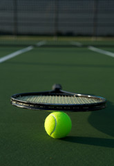 Tennis Racket on a Ball