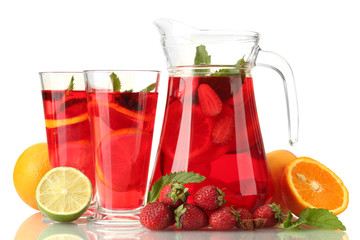 sangria in jar and glasses with fruits, isolated on white