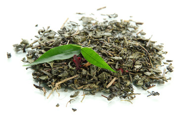 Dry tea with green leaves, isolated on white