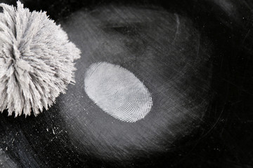Taking fingerprints isolated on black