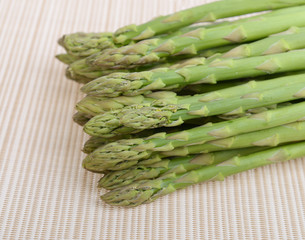Fresh asparagus on white