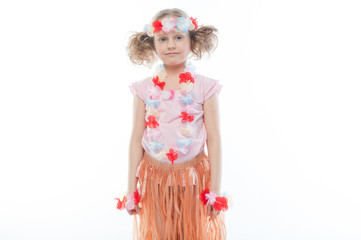 Small and beautiful girl in Hawaiian dress