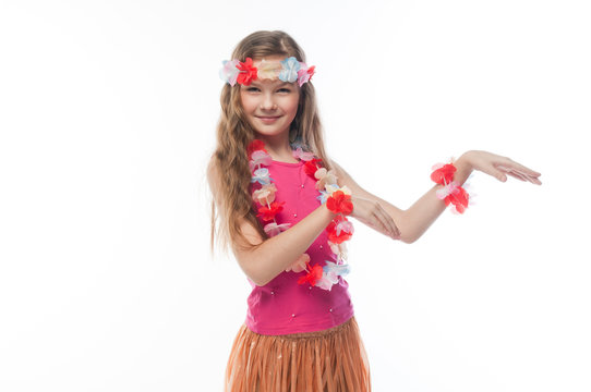 Small and beautiful girl in Hawaiian dress