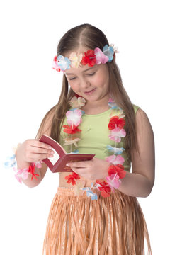 Small and beautiful girl in Hawaiian dress