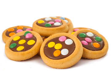 Obraz na płótnie Canvas chocolate cookies with colorful sprinkles