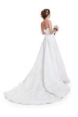 Fototapeta na wymiar Beautiful bride in luxurious wedding dress with train isolated o