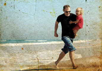 father and daughter on the beach/ Photo in old image style.