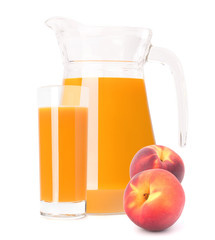 Peach fruit juice in glass jug
