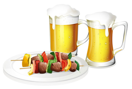 Two glasses of beer with a plate of barbeque