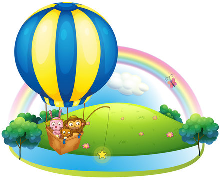 A hot air balloon with three animals