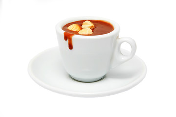 cup of hot chocolate with nuts. Isolated on white