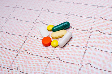 EKG chart with pills