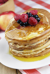 Pile of pancakes in the white plate