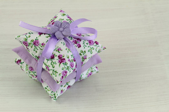 Mini lavender cushions with purple ribbon