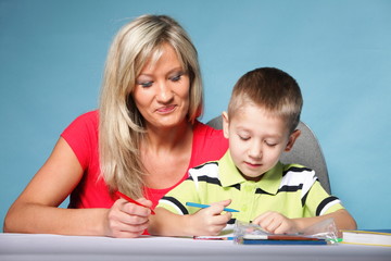 mother and son drawing together