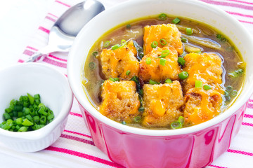 French Onion Soup in a Red Bowl