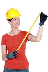 Woman using tape measure