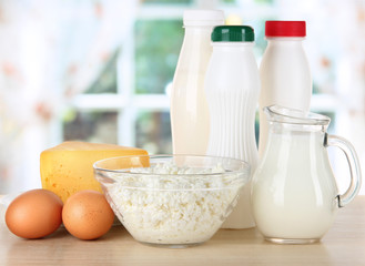 Dairy products and eggs on table in kitchen