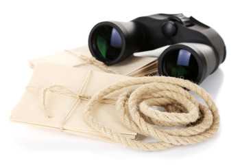 Black modern binoculars with old letters isolated on white
