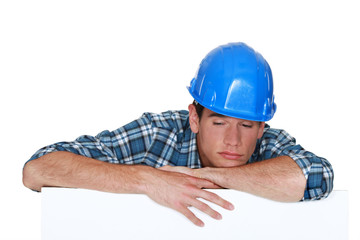 Sleepy construction worker