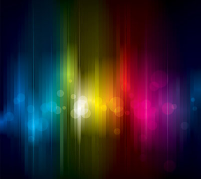 Abstract colorful light on dark background.