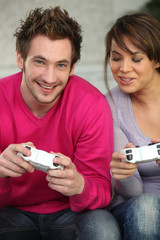 Fototapeta premium Young playing with console