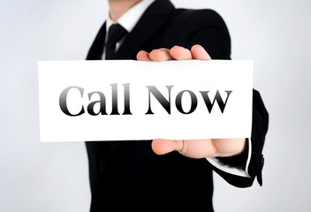 Businessman showing card