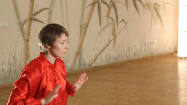 female martial artists in the room -medium shot