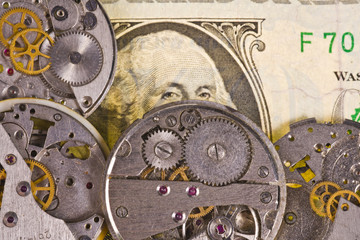 Clock mechanism with gears on dollar banknote