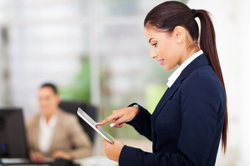 young businesswoman using tablet computer