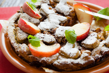 big beautiful apple pie on a dish