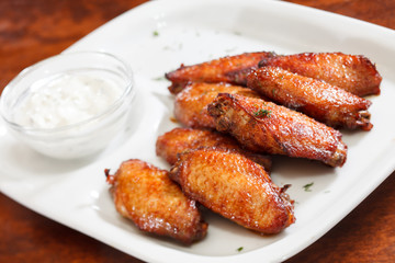Chicken wings with sauce