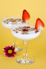 Fruit smoothies on beige background
