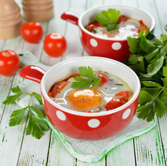 Fried eggs with vegetables