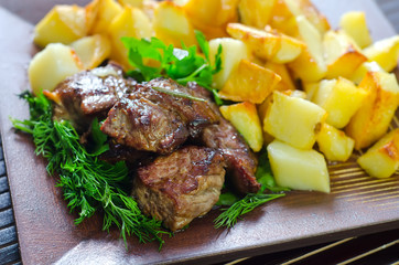 baked meat with potato