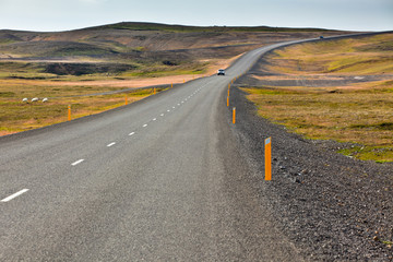 Highway through Icelandic landscape
