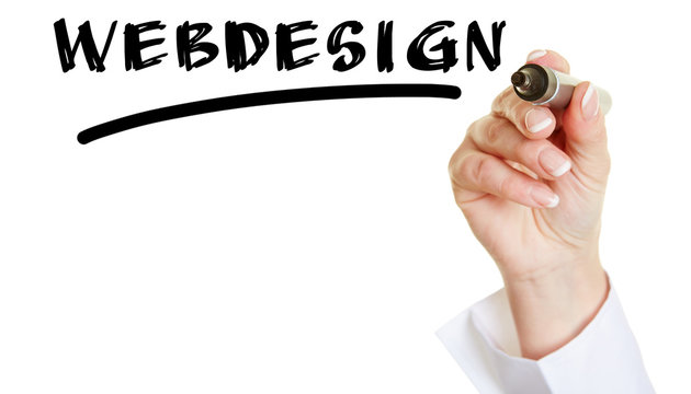 Hand schreibt das Wort Webdesign