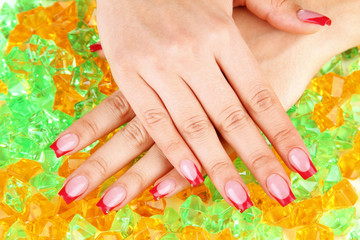 Fototapeta premium Closeup of hands of young woman with elegance manicure
