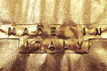 Made In Italy logo on a golden background