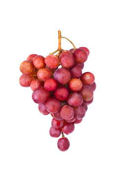 A bunch of red grapes on a white background