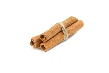 Cinnamon sticks on a white background