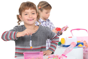 two little girls playing