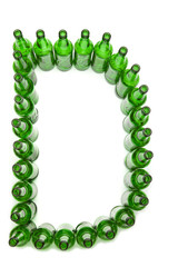 The alphabet from glass beer bottles. Letter   D
