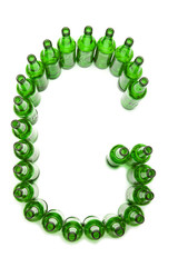 The alphabet from glass beer bottles. Letter   G