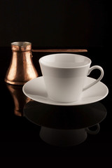 Obraz na płótnie Canvas White cup with turkish coffee pot