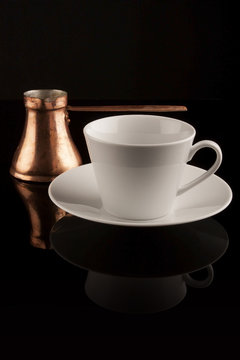 White cup with turkish coffee pot