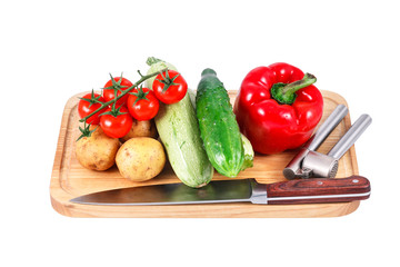 a group of fresh vegetables isolated over white background