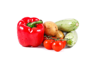 a group of fresh vegetables isolated over white background