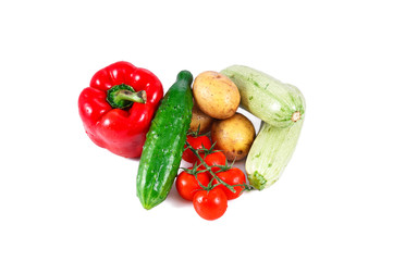 a group of fresh vegetables isolated over white background
