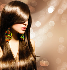 Beautiful Brunette Girl. Healthy Long Brown Hair